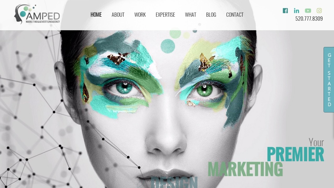 Screenshot of Amped Marketing & Advertising's Website